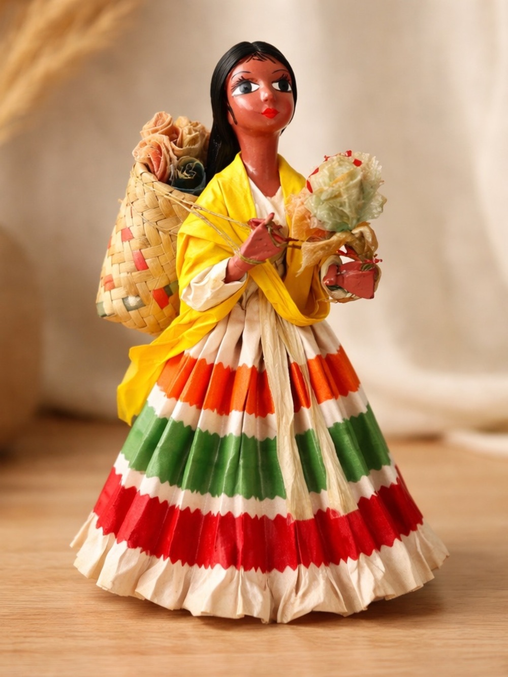 Mexican folk art paper mache doll, referred to as a "Lupita" doll or a senorita